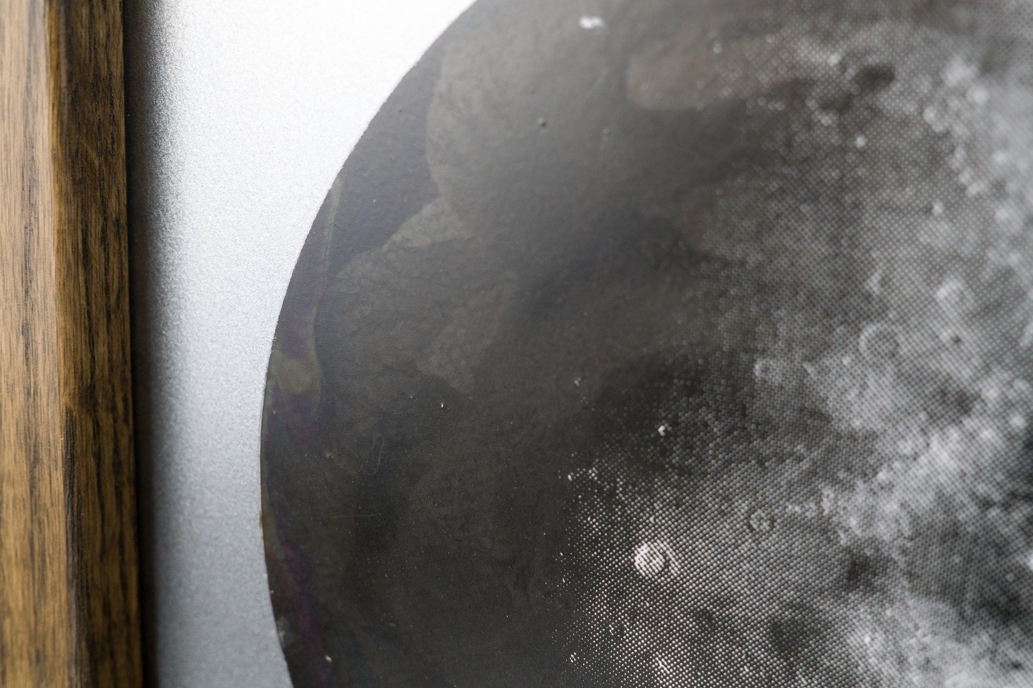 Iridescent Moon on Steel Sheet Metal