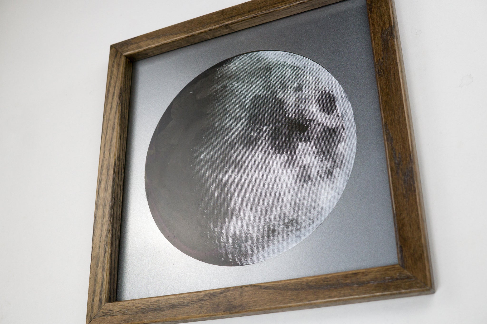 Iridescent Moon on Steel Sheet Metal